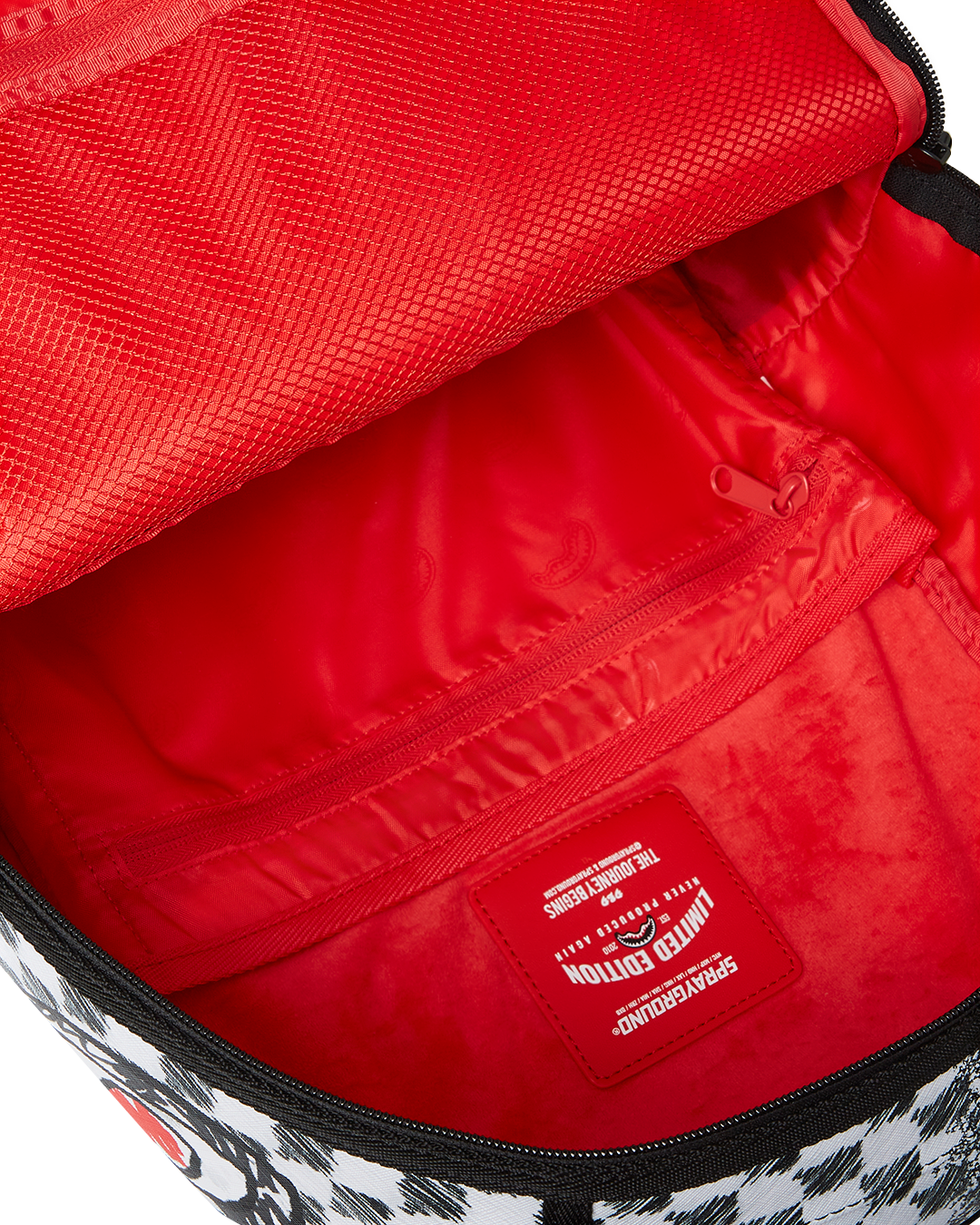 SCRIBBLE DRIBBLE CHECK BACKPACK